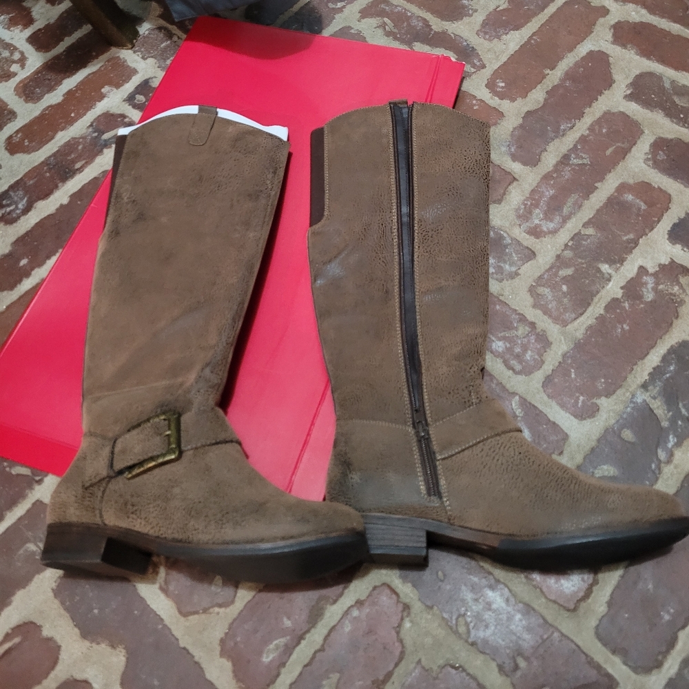 Women's size 7.5 M Kelly and katie  brown boots.  New in box never worn.